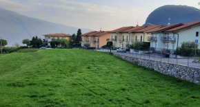 Carlino Appartamento giardino e piscina by Garda Domus Mea Pieve Di Cadore